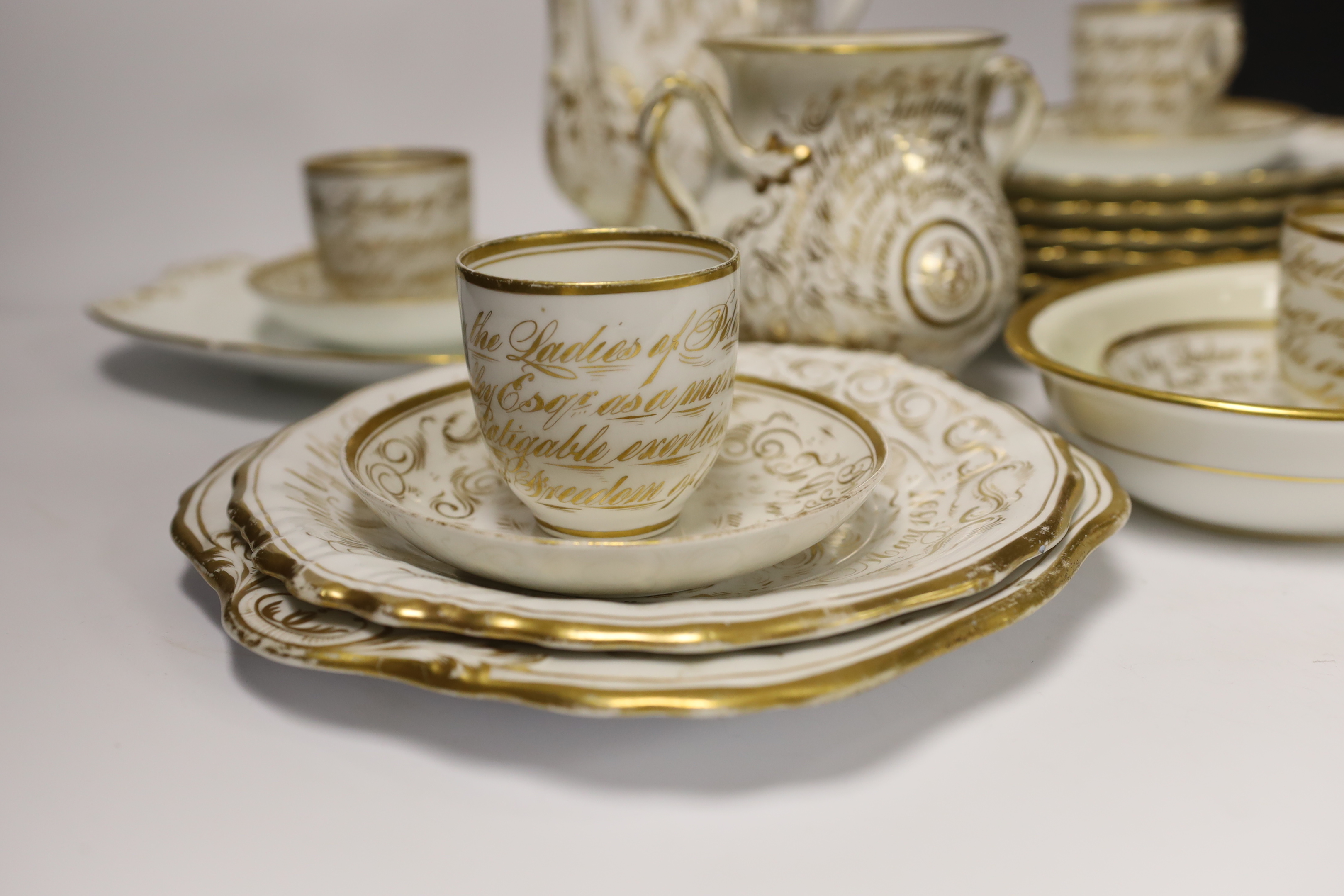 A mid-19th century English bone china part tea service, possibly Davenport, with applied gilt presentation to the Liberal politician G. H. Whalley (16 pieces), teapot 24.5cm together with Limoges plates